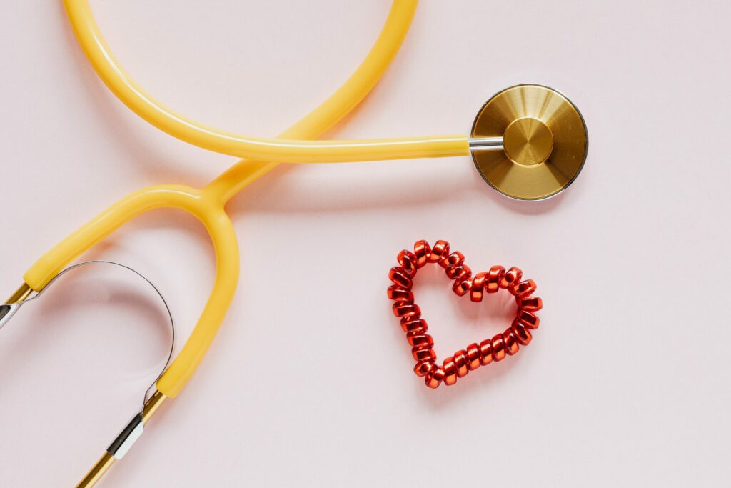 Healthcare Provider stethoscope and heart shaped bracelet